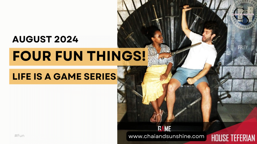 Four Fun Things! Life is a Game Series (August 2024) - Picture of interrracial couple on the iron throne in Game of Thrones themed escape room