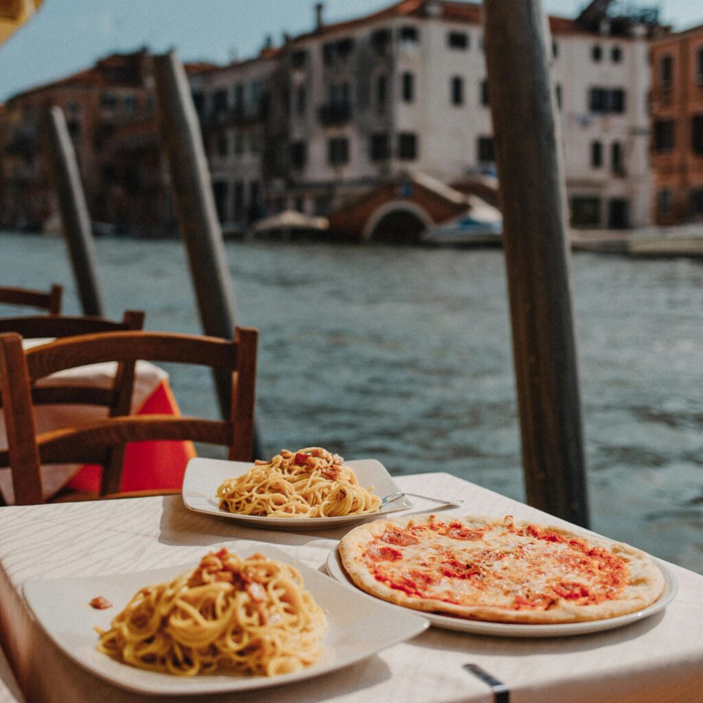 Pizza and pasta in Venice near the water canal - a blog post about European cuisine